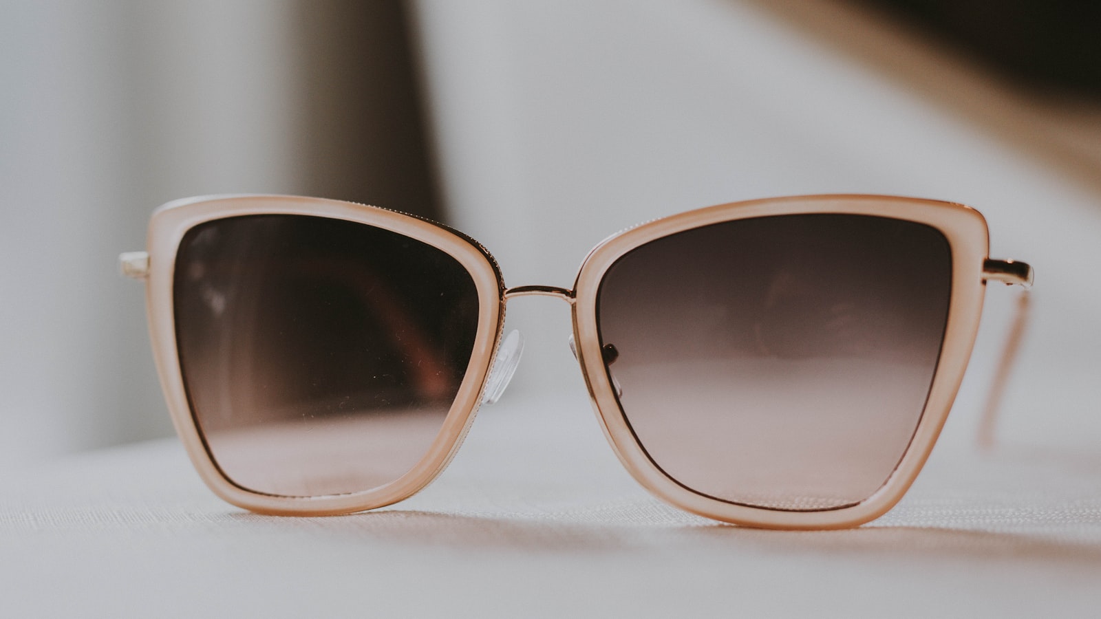 Silhouette in sunglasses against low sun — sunglasses lens categories cat 0 to 4 chart