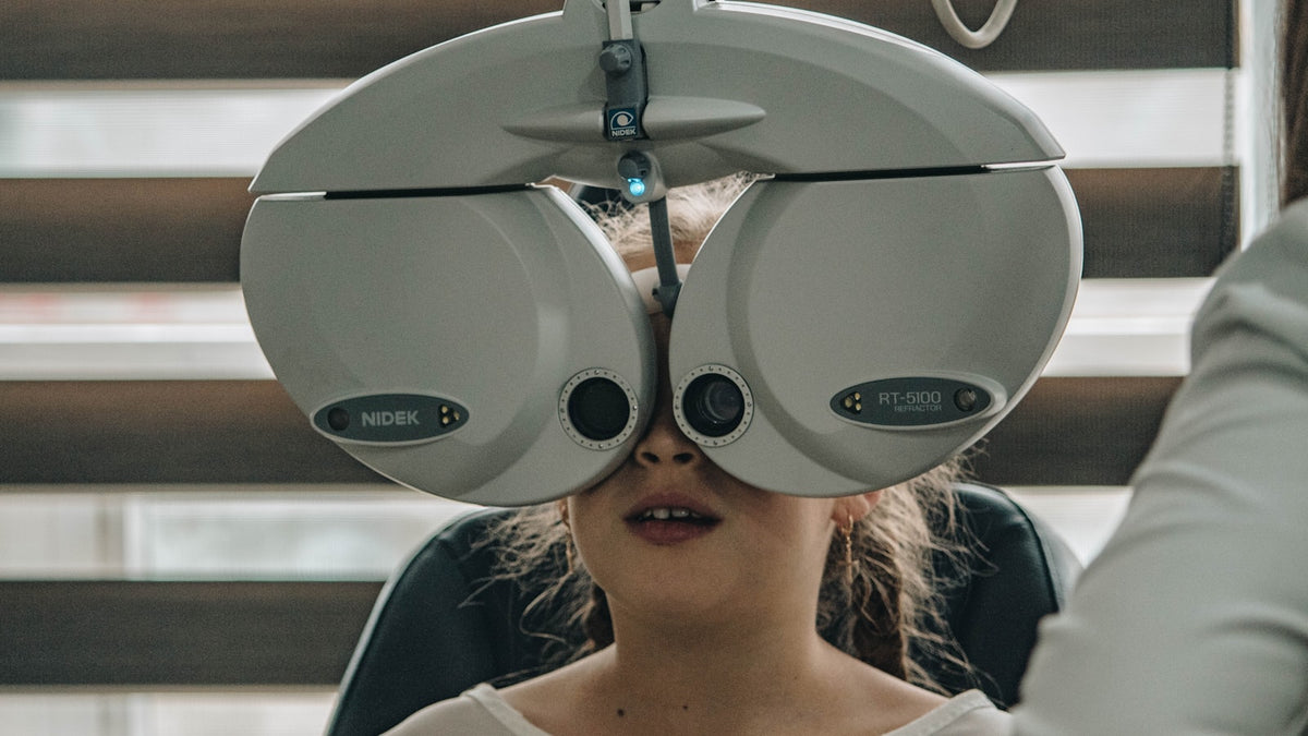 White optical phoropter used during an eye exam