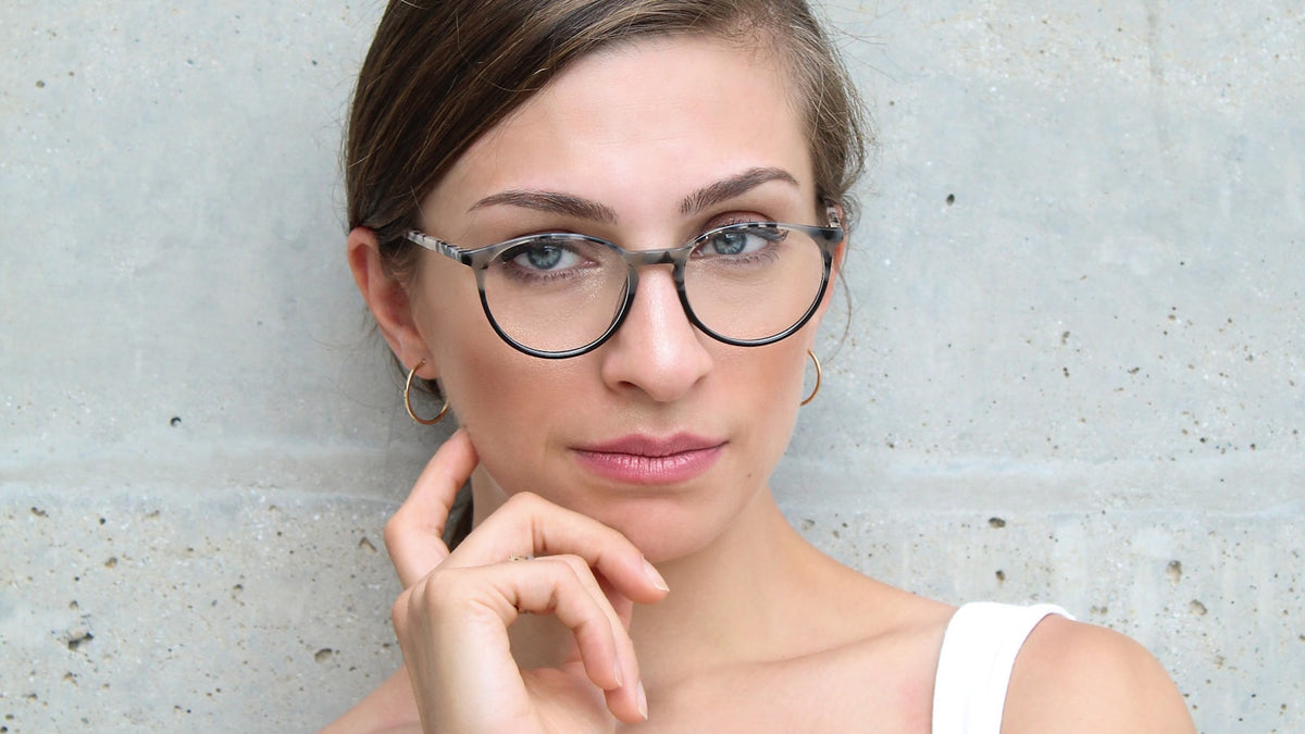 Person wearing stylish glasses