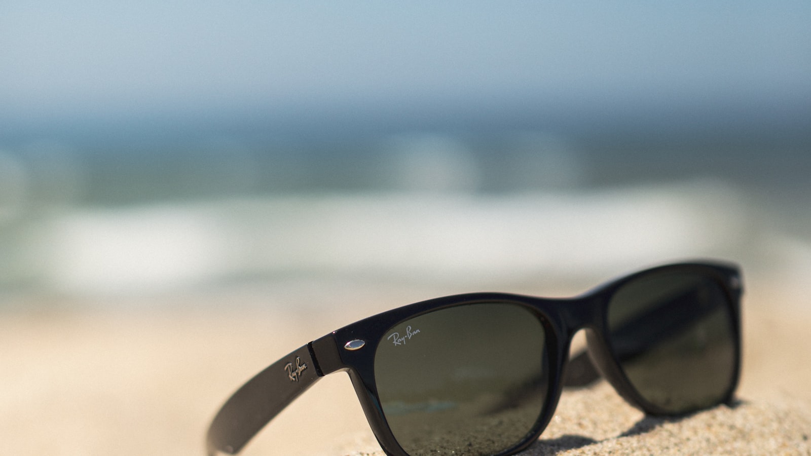 Person wearing eyeglasses in natural light — how to choose glasses frames guide