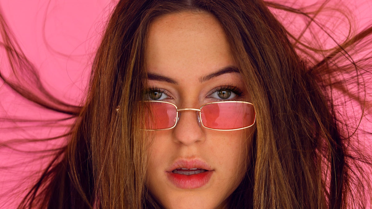 Person wearing glasses outdoors