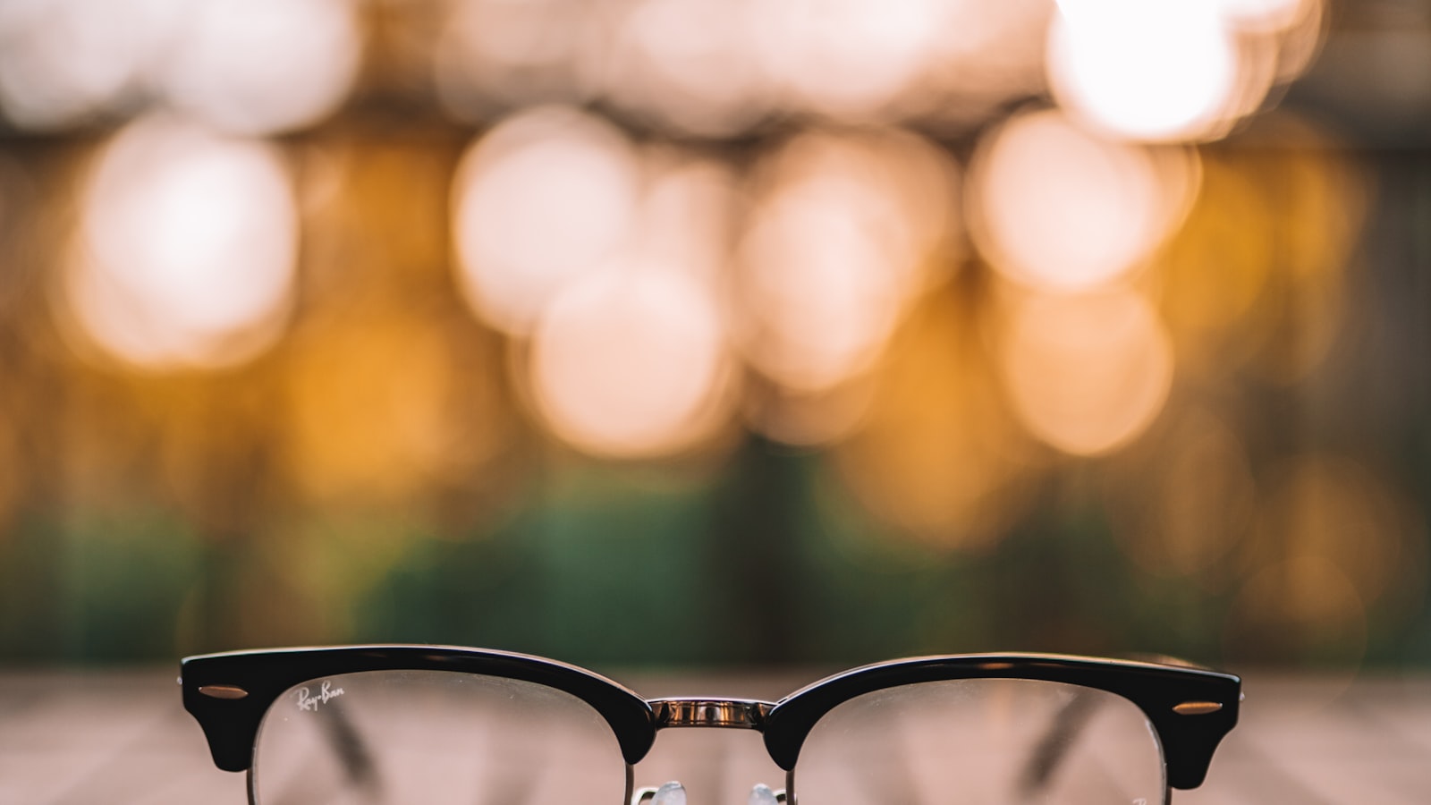 Person in glasses at a desk