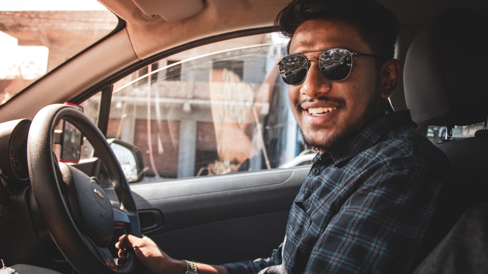 Sunlight through a car windshield — do photochromic lenses work in cars