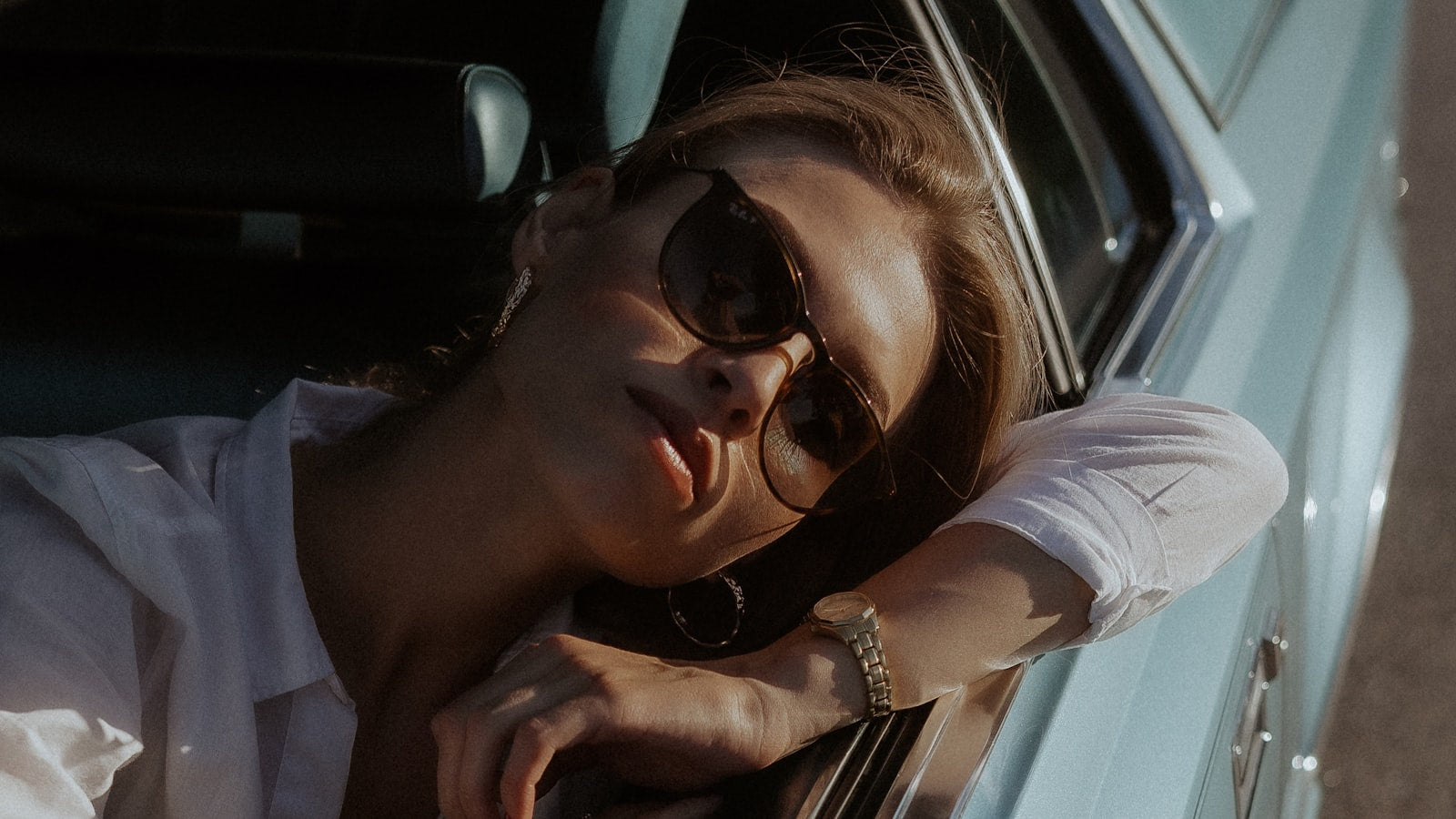Person wearing glasses and sunglasses outdoors