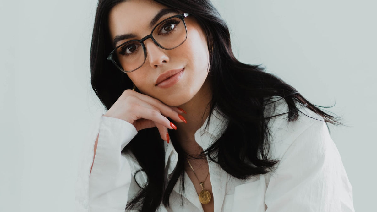 Woman wearing eyeglasses, front view